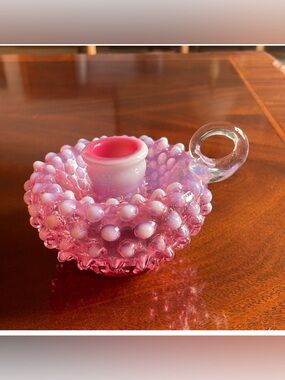 Fenton Cranberry opalescent hobnail candle holder.